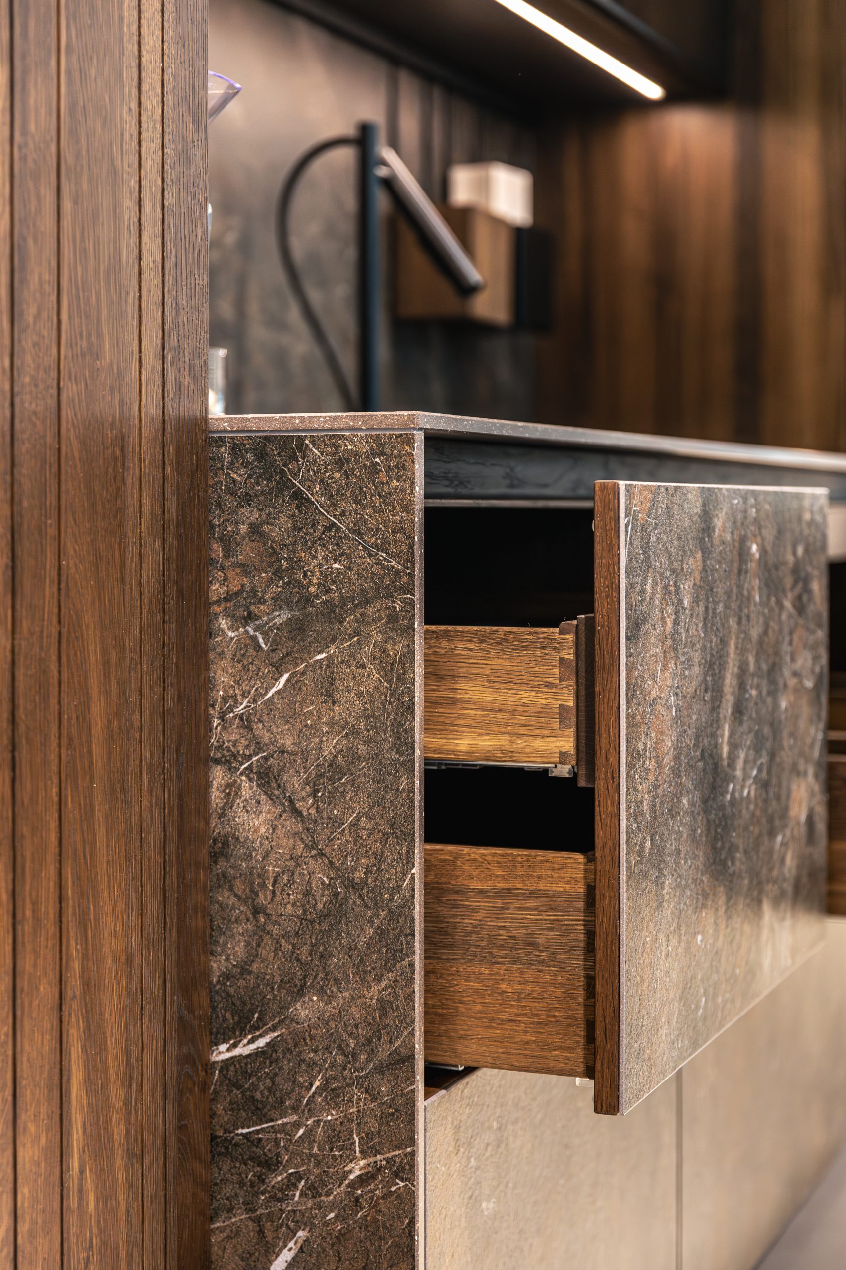 Elegant stone-look surface and cabinetry finish